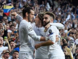 MADRID, SPAIN - MAY 04: Gareth Bale of Real Madrid celebrates with Daniel Carvajal of Real Madrid and Luka Modric of Real Madrid scoring the opening goal during the UEFA Champions League semi final, second leg match between Real Madrid and Manchester City FC at Estadio Santiago Bernabeu on May 4, 2016 in Madrid, Spain. (Photo by David Ramos/Getty Images )